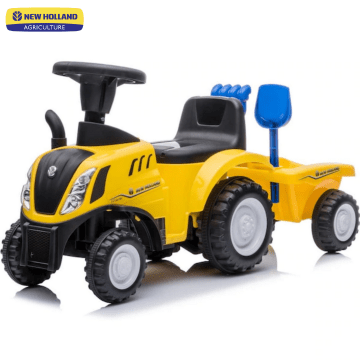 New Holland traktor za vožnju s prikolicom žuta