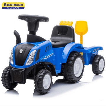 Plavi traktor New Holland za vožnju s prikolicom