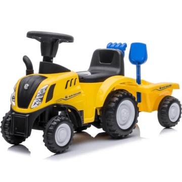 New Holland traktor za vožnju s prikolicom žuta